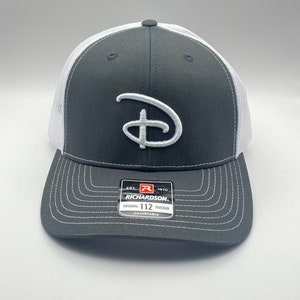 May include: A set of three ceramic mugs with a speckled, matte finish. The mugs are in shades of cream, light brown, and dark brown. Each mug has a simple, minimalist design, perfect for coffee or tea.