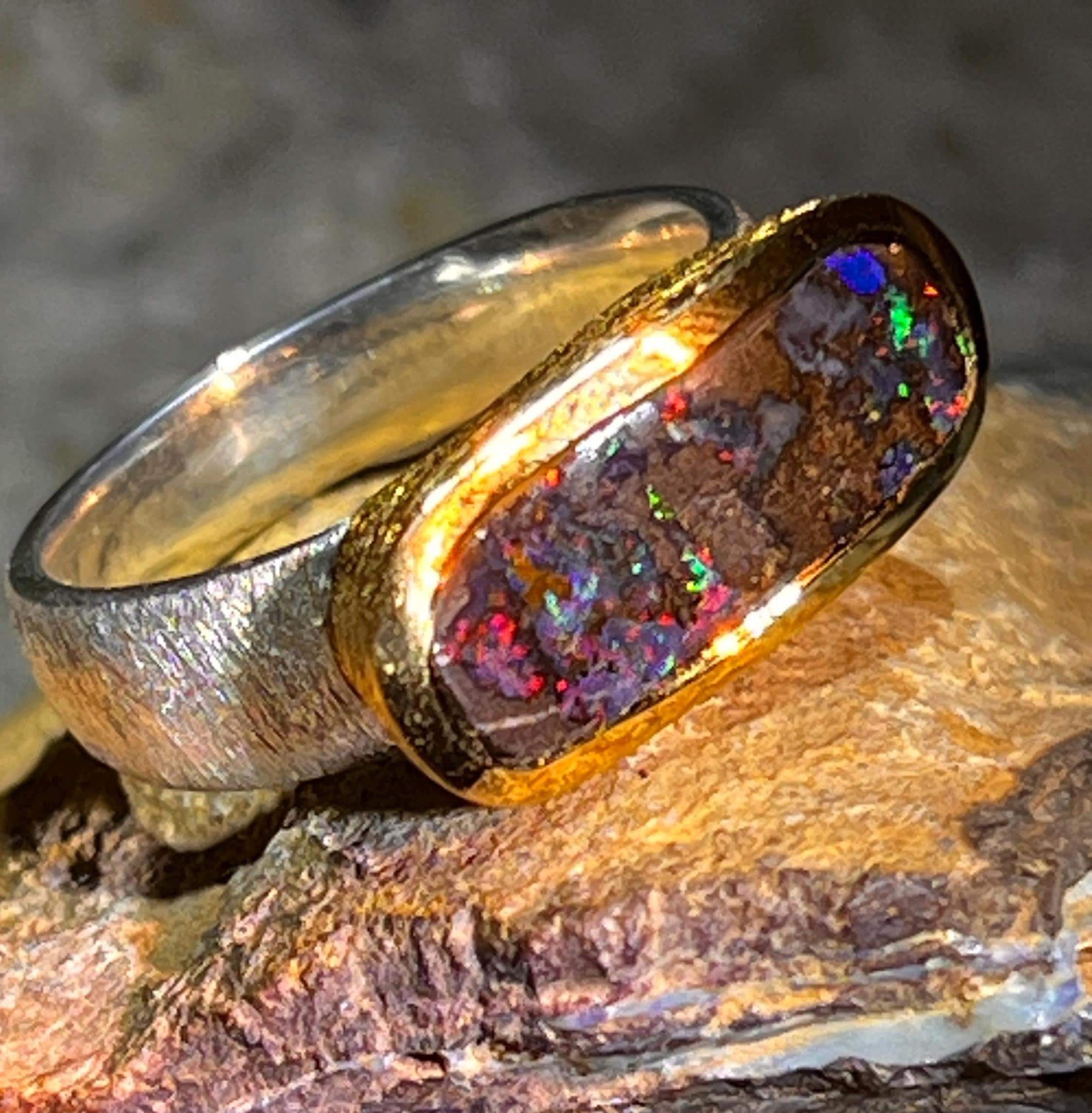 Boulder Opal Fire Flashes Ring in silver with gold-plated setting