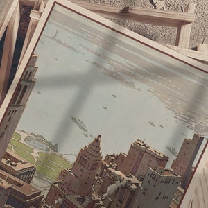 May include: Vintage postcard featuring a bird's eye view of the New York City skyline with the Statue of Liberty in the distance. The postcard is framed by wooden planks.