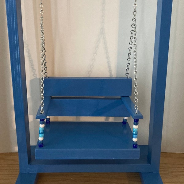 Swing for 18 inch dolls like American Girl Dolls or similar sized dolls. It has colorful beads to match.