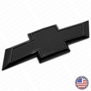 May include: Black Chevrolet emblem with a textured surface. The emblem is a popular replacement for older or damaged emblems.