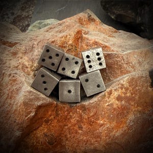 Six pewter dice