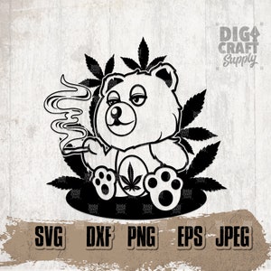 May include: Black and white illustration of a cartoon bear wearing a marijuana leaf on its chest and smoking a joint. The bear is surrounded by marijuana leaves.