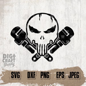 May include: A black and white digital design featuring a skull with a crossed pair of adjustable wrenches. The skull has a menacing expression with a prominent jawline and teeth. The wrenches are positioned in an X shape, with the handles crossing in the centre of the skull. The design is set against a white background.