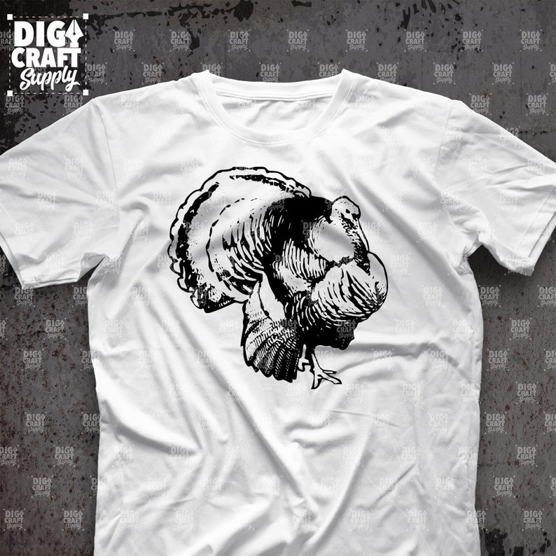 May include: A white t-shirt with a black and white illustration of a turkey on the front.