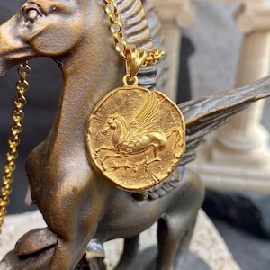 Gold filled Pegasus coin pendant necklace with winged horse design