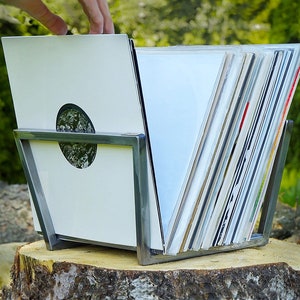 Silver now playing record stand