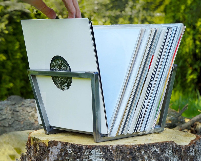 Silver now playing record stand