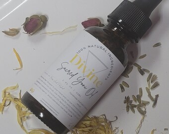 May include: A brown glass bottle of "Divine Sacred Yoni Oil" with a black dropper, surrounded by dried flower petals and buds. The label reads "100% Natural Ingredients" and "1 fl oz | 30ml".