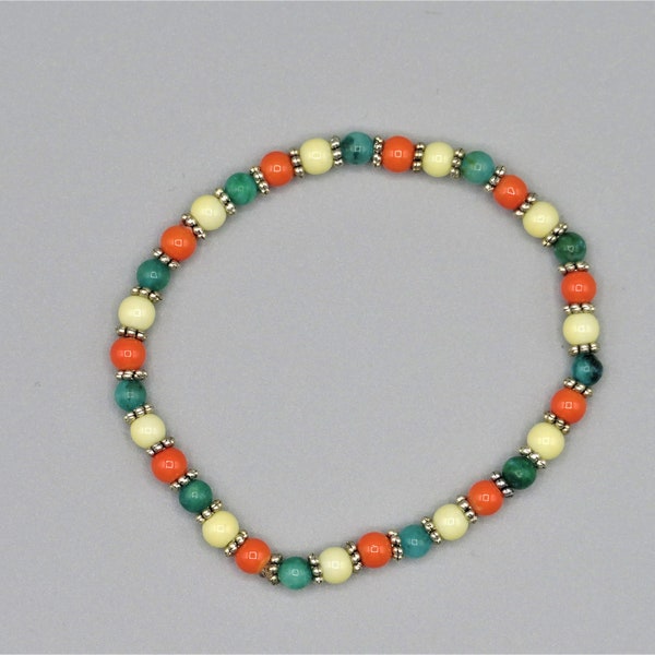 handmade elastic bracelet, beaded bracelet. glass beaded bracelet, salmon green and cream color beaded bracelet