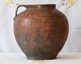 old clay pot. Wabi sabi black pottery. Farm house Rustic Decor