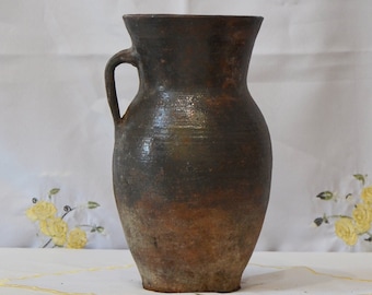 old clay vase. Wabi sabi black brown pottery pot. Shabby chic Rustic Decor