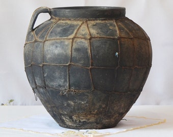 Large antique black clay vessel. Old tall black vase. Wabi sabi pottery pot.