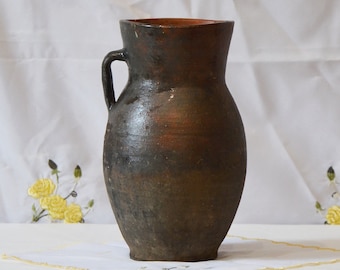 old clay vase. Wabi sabi black brown pottery pot. Shabby chic Rustic Decor