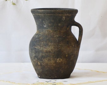 Black pottery primitive vessel. Tall black rustic ceramic pot. Wabi sabi pottery vase.