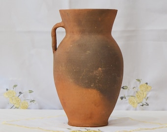 old clay vase. Wabi sabi black brown pottery pot. Shabby chic Rustic Decor