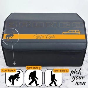 May include: A gray and black storage container with the word "BRONCO" in orange. It features an orange stripe with a horse logo and the text "Yafes Vinyaki". Below are three icon styles to choose from: a horse, a bigfoot, and a person.