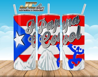 May include: A stainless steel tumbler with a red, white, and blue Puerto Rican flag design. The tumbler features the text "Papaya Cool" in a silver metallic font and a blue stylized figure with a star on its chest.