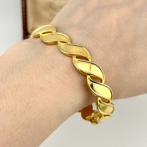 Vintage-Armreif aus Gold mit skulpturalem Scharnierverschluss, auffälliger Armreif mit Manschette, Schmuck aus den 1980er Jahren