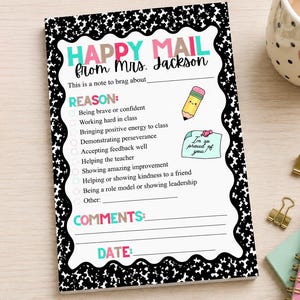 May include: A rectangular notepad with a black and white speckled border featuring the text HAPPY MAIL from Mrs. Jackson. It includes a checklist for reasons to brag, a pencil illustration, a sticky note graphic, and lines for comments and date.