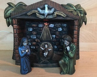 木製のキリスト降誕の像と素焼きの人形が付いたヴィンテージのキリスト