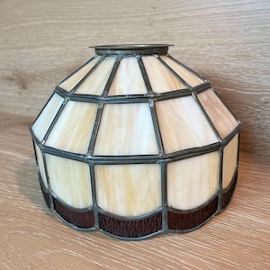 May include: A rustic wooden sign with the text "Welcome to our home" in white lettering. The sign features a distressed finish and a simple, inviting design, perfect for entryway decor.