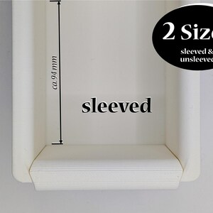 May include: White rectangular box with a white lid. The box is 9.4 cm tall and has the word "sleeved" printed on the front. The box is available in two sizes: sleeved and unsleeved.