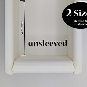May include: White plastic drawer organizer with a lip on the front edge. The organizer is approximately 90 mm tall. The text "unsleeved" is printed on the front of the organizer. The text "2 Sizes sleeved & unsleeved" is printed on a black circle.