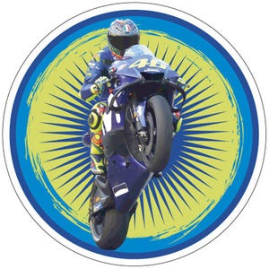 May include: A circular sticker featuring a motorcycle rider in a blue racing suit and helmet performing a wheelie on a dark blue motorcycle with the number 46 displayed on the front. The background is a yellow sunburst pattern with a blue border.
