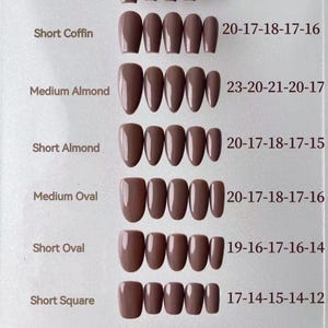 May include: A chart showing different nail shapes and sizes with measurements in inches. The shapes include long coffin, short coffin, medium almond, short almond, medium oval, short oval, short square, and short round.