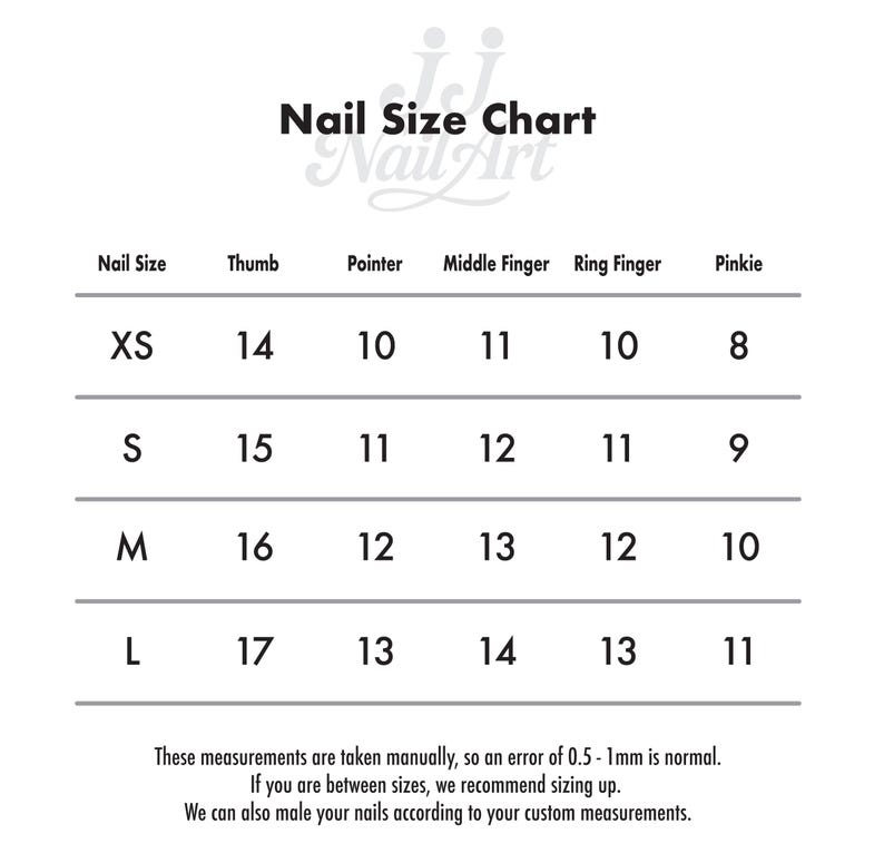 May include: A white nail size chart with black text. The chart lists nail sizes XS, S, M, and L, with corresponding measurements for thumb, pointer, middle finger, ring finger, and pinkie. The text at the bottom provides sizing recommendations.