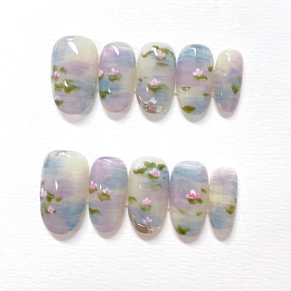 Handgeschilderde waterleliepers: herbruikbare kunstnagels