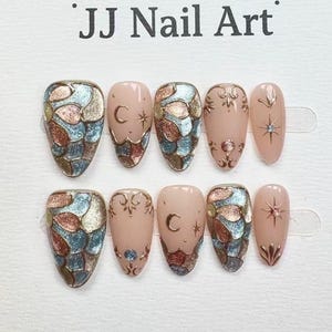 Uñas postizas con diseño de ojo de gato pintadas a mano: Uñas postizas reutilizables para artistas.