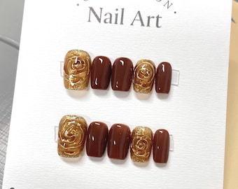 Handgemaakte herfstroos pers op de nagels: bruine en gouden gel, herbruikbaar