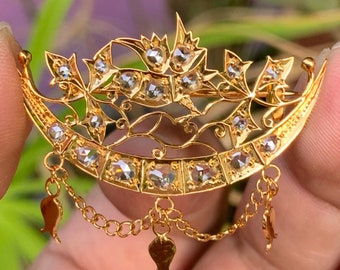 Handmade bird brooch with rose cut diamond.