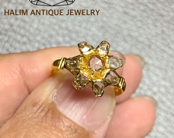 A gorgeous Antique Rose Cut Diamond Flower Ring.