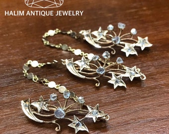 A gorgeous set of three antique gold brooches set with Polki Diamonds with patterned chains.