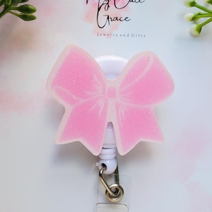 Ausweisrolle Schleife pink,Abzeichenrolle pink,schwarze Schleife,Buttonrolle Schleife pink,Abzeichenrolle Spaß