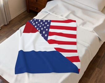 May include: A rectangular throw blanket featuring a split design. One half displays the American flag with red and white stripes and a blue canton with white stars. The other half features a horizontal tricolor pattern of red, white, and blue.