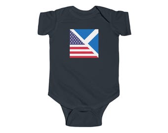 May include: A dark blue baby onesie with a square graphic of the American flag and the Scottish flag combined.