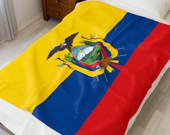 May include: A blanket featuring the flag of Ecuador, with a yellow upper section, a blue middle section, and a red lower section. The flag's emblem, including an Andean condor, is centered on the yellow field. The blanket is on a bed.