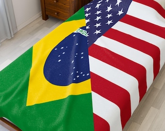 May include: A bedspread featuring the flags of Brazil and the United States. The Brazilian flag is green, yellow, blue, and white. The American flag is red, white, and blue. The bedspread is on a wooden bed frame.