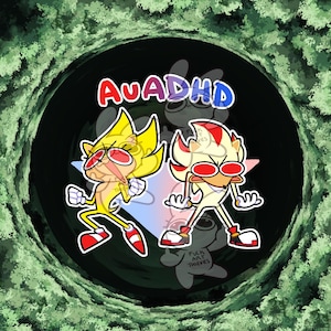 May include: Digital illustration of two cartoon characters wearing sunglasses. One is yellow with red shoes, the other is cream-coloured with red accents. The text "AuADHD" is above them. The background is a dark green tunnel.