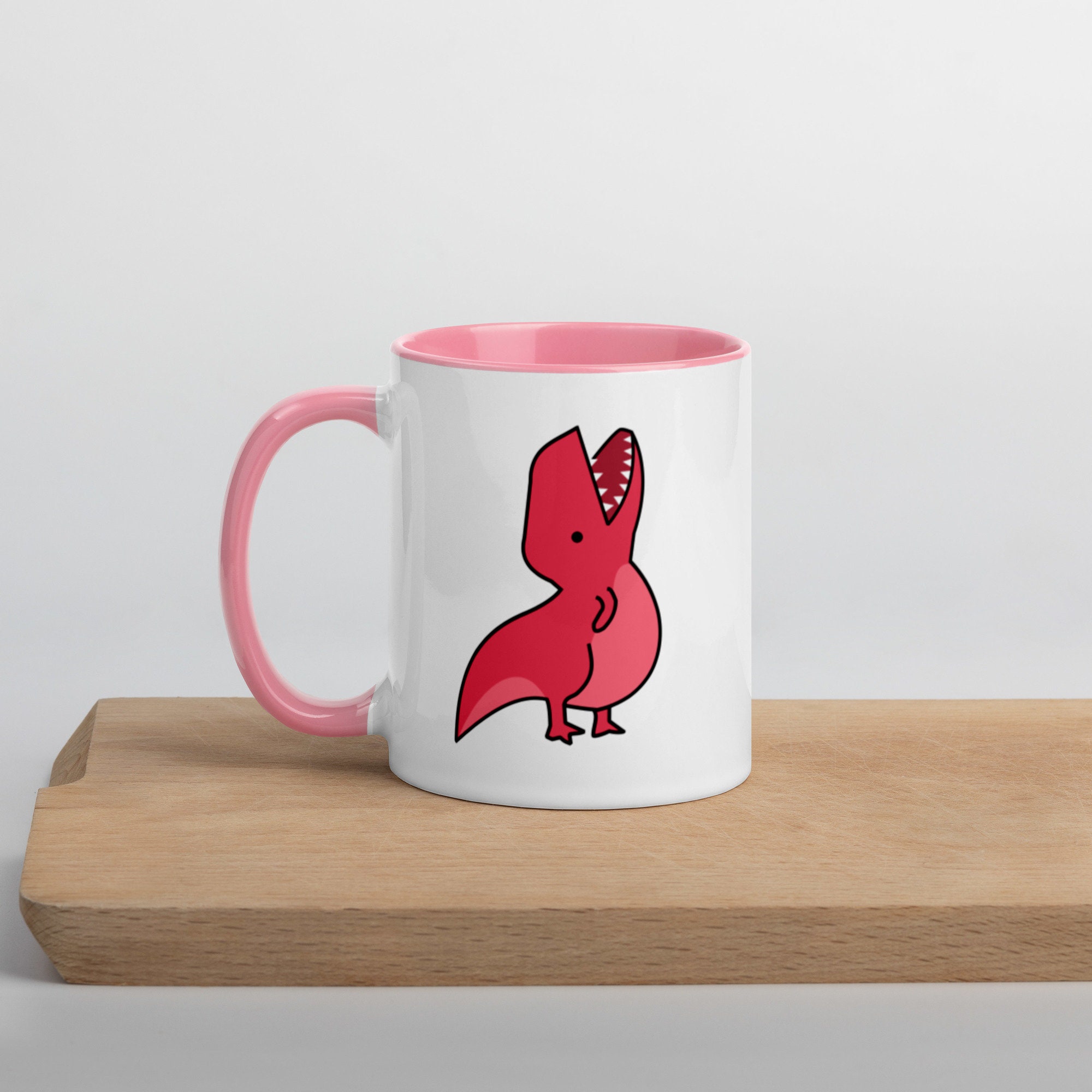 Mug Blanc Brillant à L'intérieur Coloré en Rose ou Noir - T Rex Nourrir