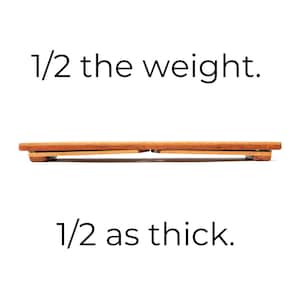 May include: A side view of a wooden tray with a light brown finish. The text "1/2 the weight" and "1/2 as thick" are displayed in black font. The tray is constructed from several thin wooden slats, suggesting a lightweight design.