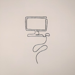 May include: A minimalist black wire sculpture of a computer monitor and mouse against a neutral background. The continuous line art depicts the essential shapes of the technology, creating a modern and simple aesthetic.