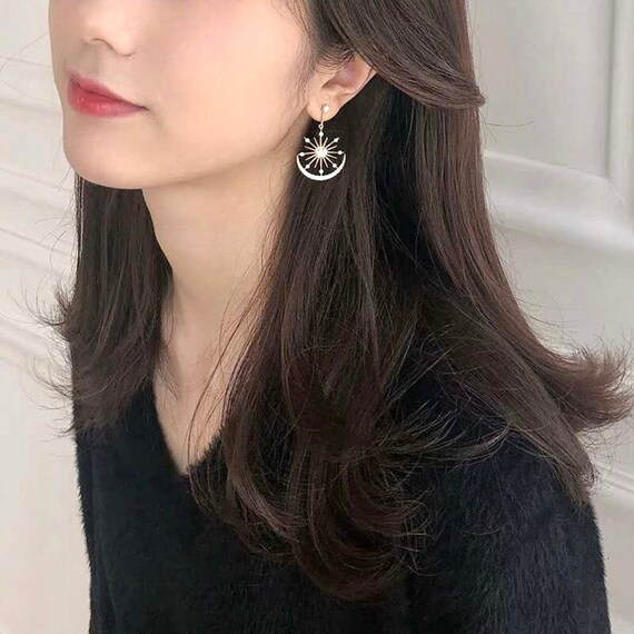 Dangle star and store moon earrings