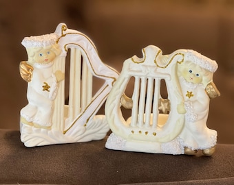 Two vintage candlesticks holders, white angels with harps