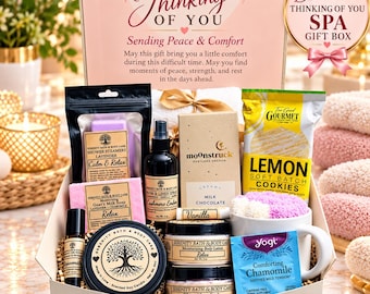 May include: A gift box containing Serenity Bath & Body Care products including lavender shower steamers, goat's milk soap, room spray, body lotion, whipped sugar scrub, and a soy candle. Includes Moonstruck milk chocolate, lemon cookies, a mug, and Yogi tea.