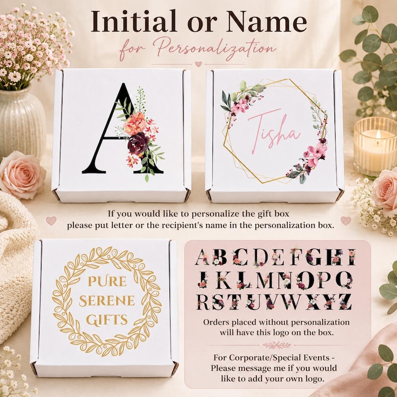 May include: Three white square gift boxes with floral and gold text designs. One box features a large black letter A with flowers, another a gold geometric frame with the name Tisha, and the third a gold laurel wreath with Pure Serene Gifts text.